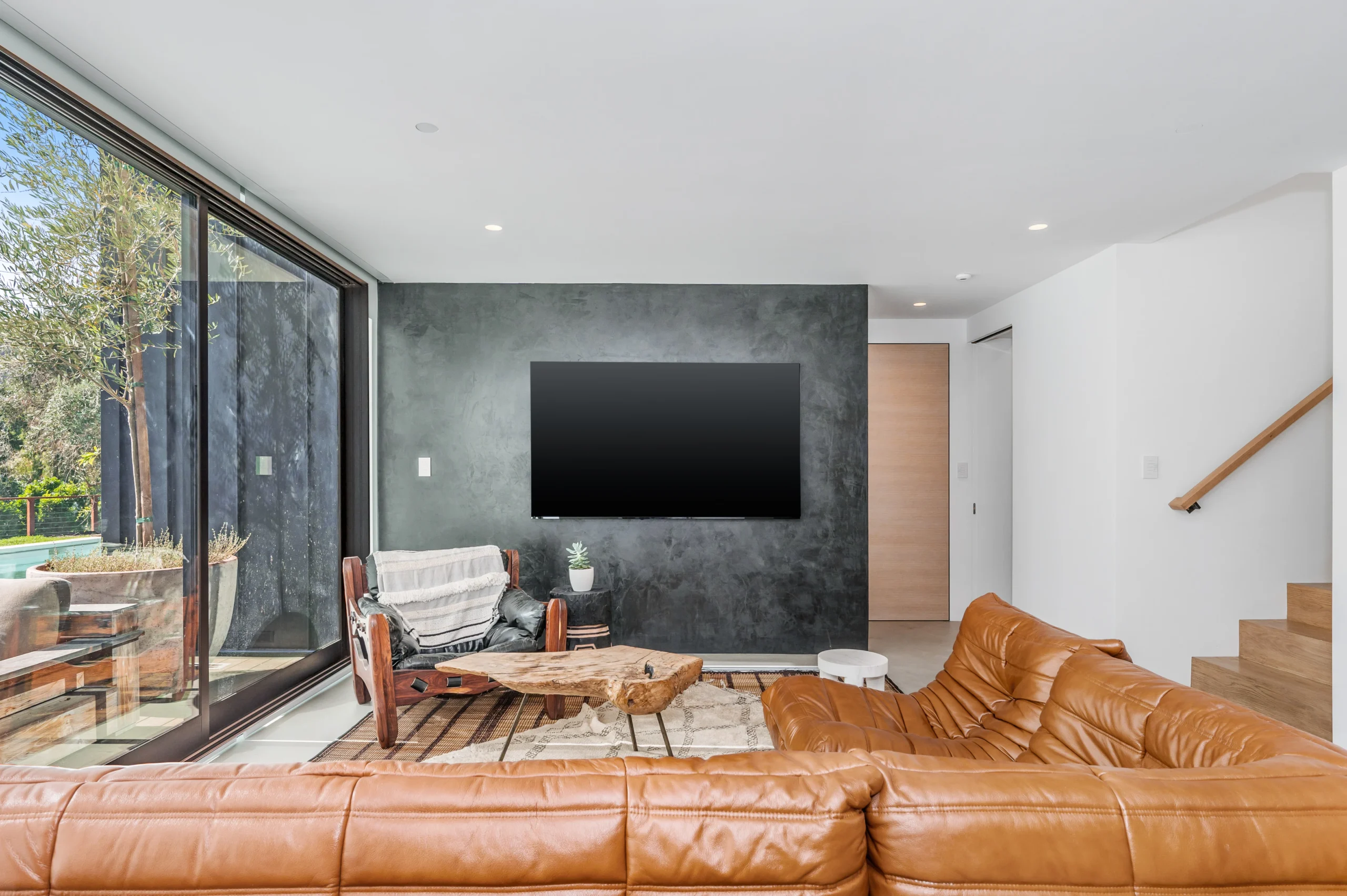 Wall-mounted television with neatly routed cables